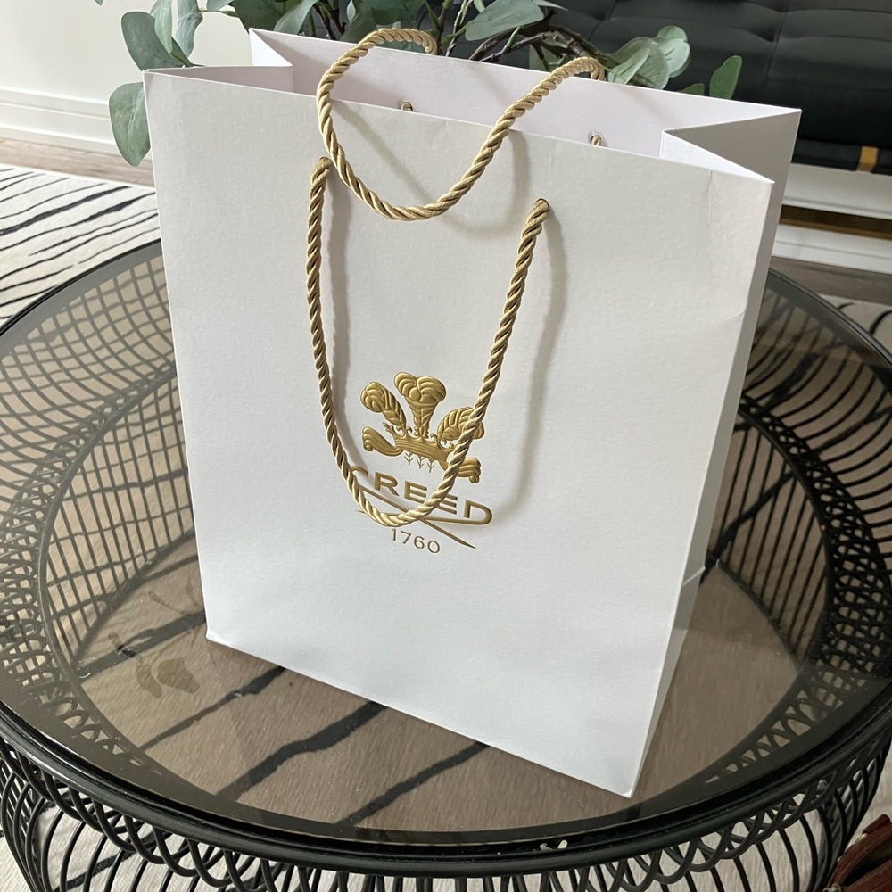 Creed White Bag with Gold Accents